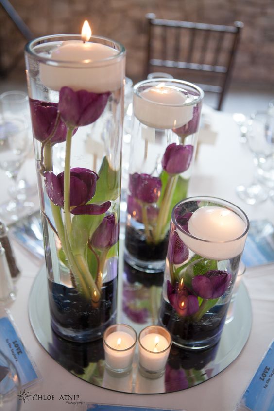 Centros de mesa para 15 años con flores en agua