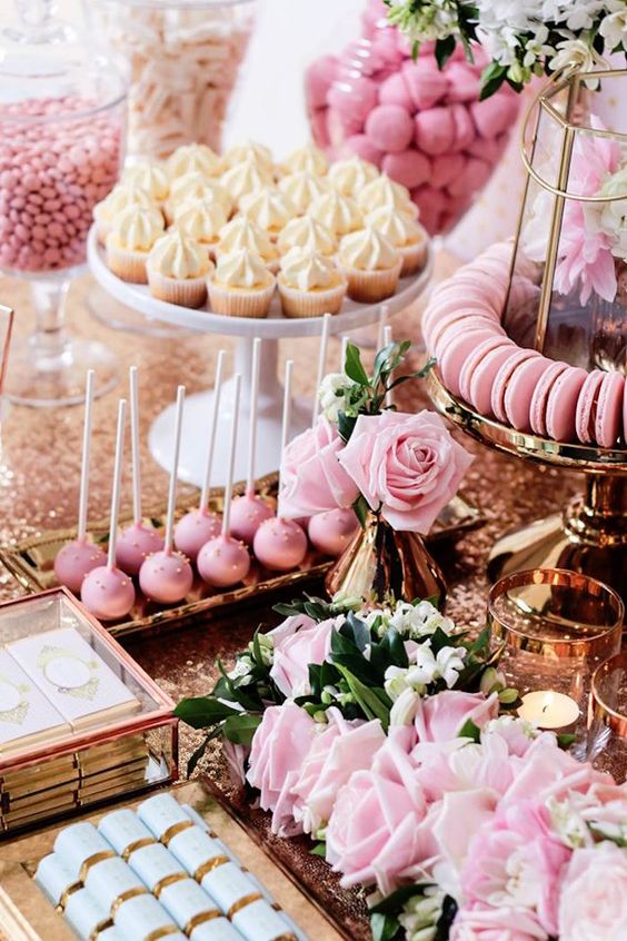 candy table with cupcakes
